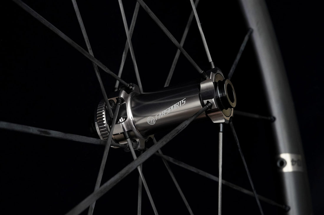 Close-up of a rear hub and freehub body with the spokes running away from it