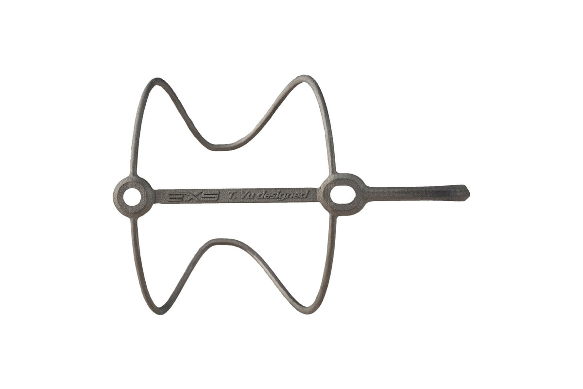 EXS titanium bottle cage, second finish, laid flat