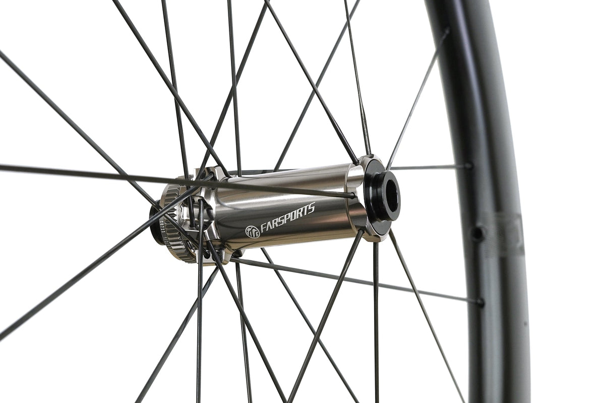 Farsports CH01 front hub close-up with Alpina Ultralite steel spokes
